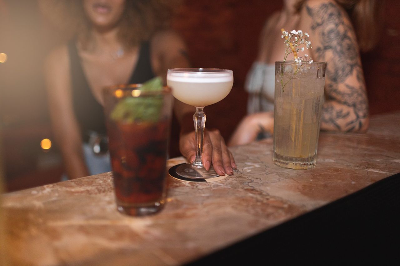 Women at a bar (stock image).